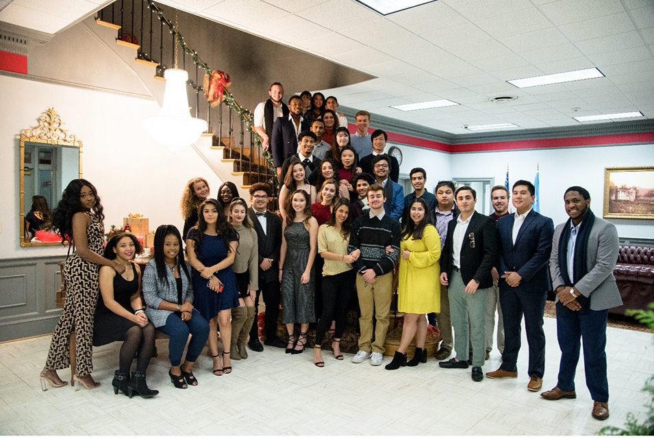 Students on the stairs at the International House