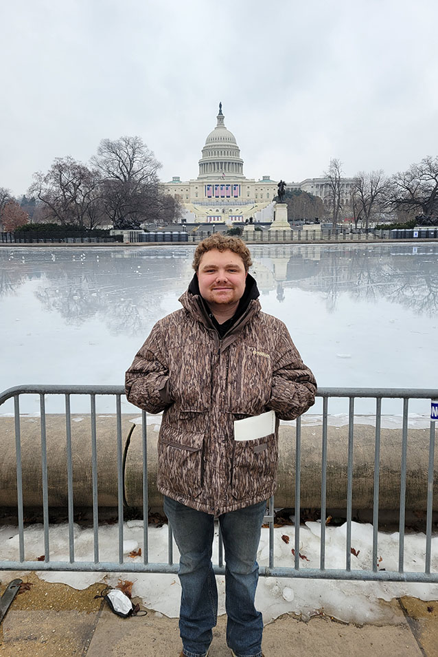 Morgan in front of White House