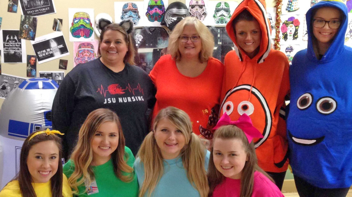 Doctor Walker with her clinical students at Mountain View Hospital on Halloween 2018. 